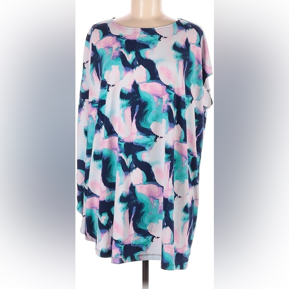 Iman short sleeve top. Size large. Very drapery. Would fit most any size.